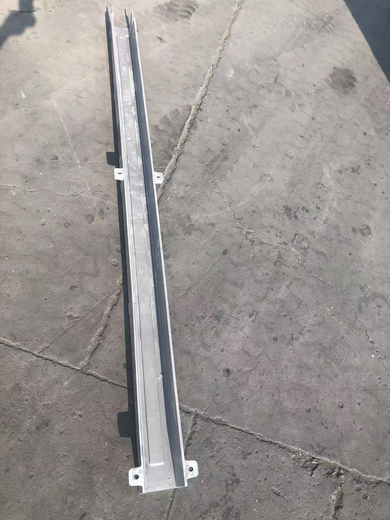 Trough and fixing holes